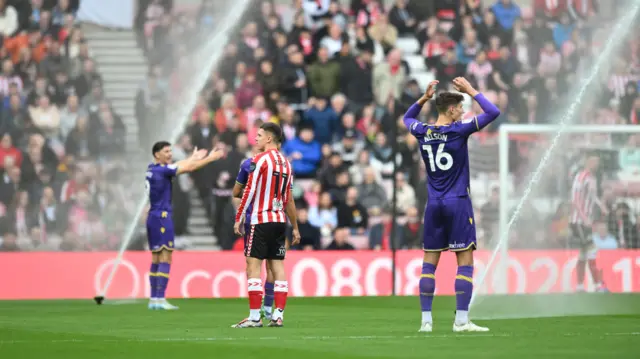 Sprinklers come on at Stadium of Light