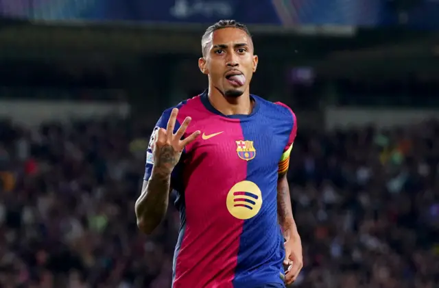 Raphinha of FC Barcelona celebrates scoring his team's fourth goal and his hat-trick goal