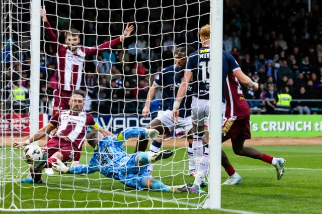 Nicky Clark scores for St Johnstone against Dundee