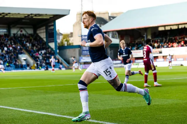 Simon Murray celebrates after scoring for Dundee against St Johnstone