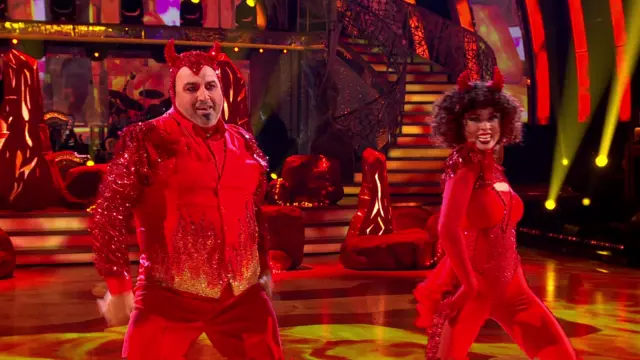 Wynne Evans and his partner Katya Jones in devil outfits