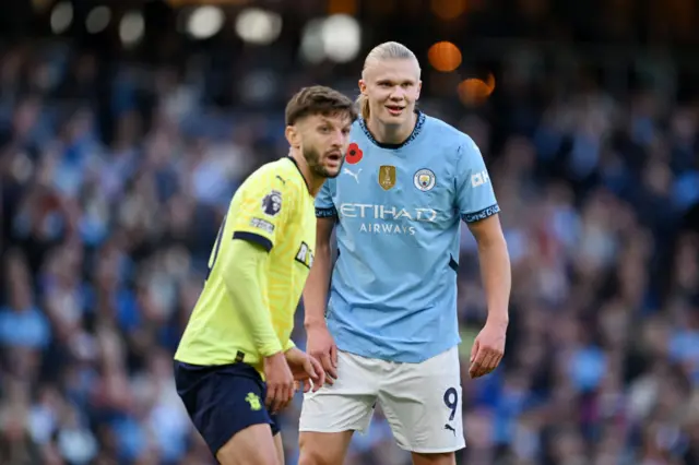 Adam Lallana and Erling Haaland