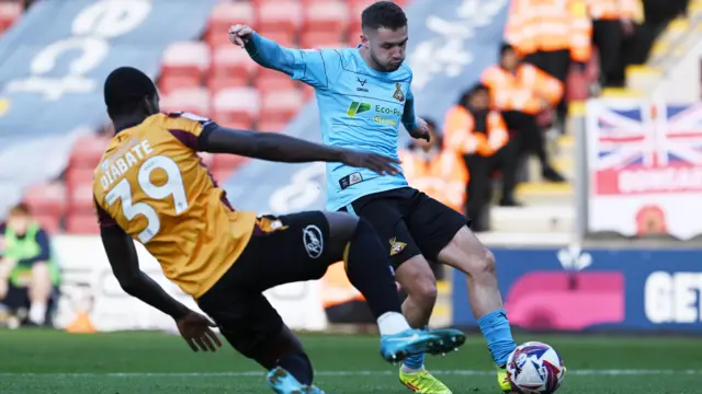 Luke Molyneux scores for Doncaster against Bradford.