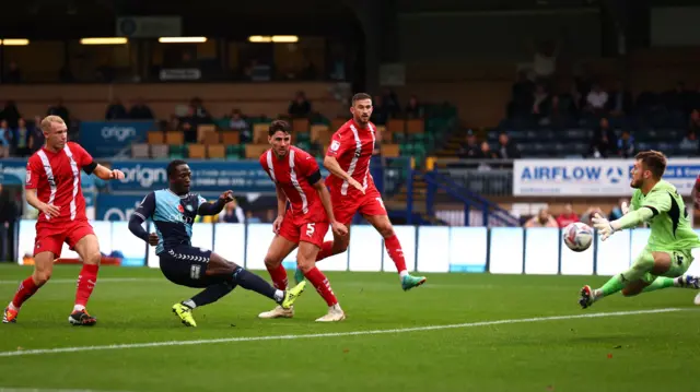 Daniel Udoh scores for Wycombe against Leyton Orient.