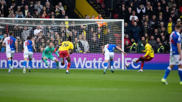 Edo Kayembe of Watford scores a penalty