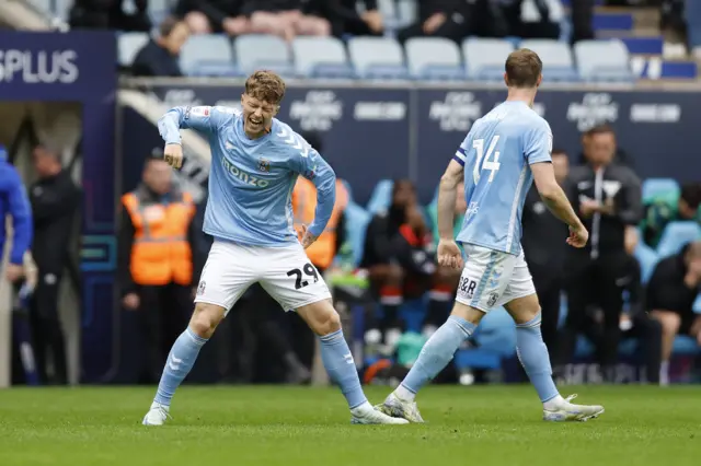 Victor Torp of Coventry celebrates