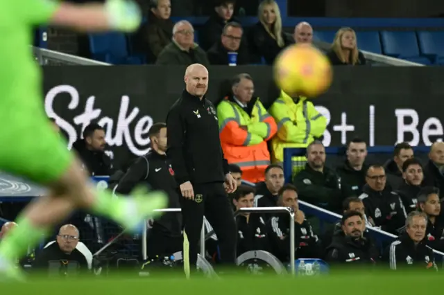 Dyche watches on from the touchline