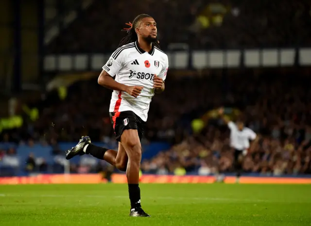 Iwobi runs to celebrate his goal