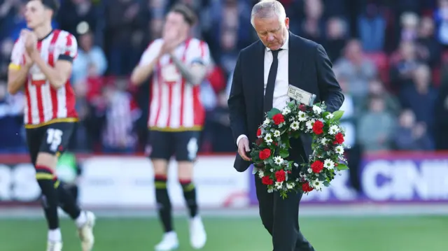 Chris WIlder pays tribute to George Baldock