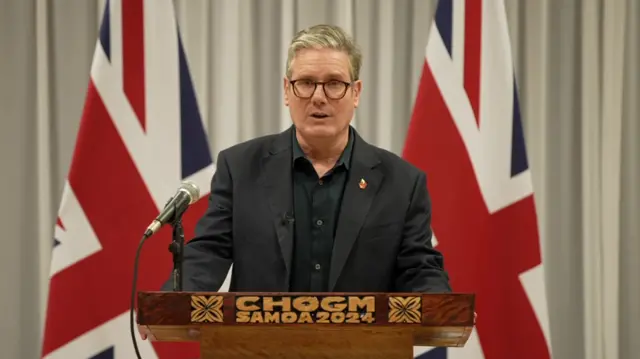 Keir Starmer speaking at a press conference in Samoa