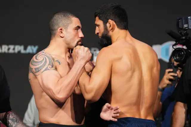 Robert Whittaker and Khamzat Chimaev face off before UFC 308 in Abu Dhabi