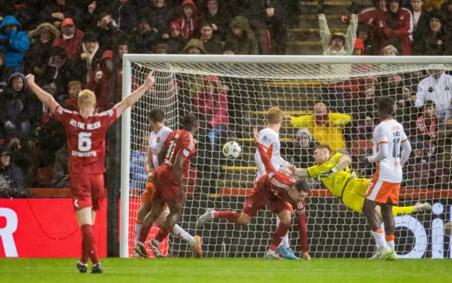 ABERDEEN, SCOTLAND - OCTOBER 26: Dundee United's Jack Walton makes a great save during a William Hill Premiership match between Aberdeen and Dundee United at Pittodrie Stadium, on October 26, 2024, in Aberdeen, Scotland. (Photo by Alan Harvey / SNS Group)