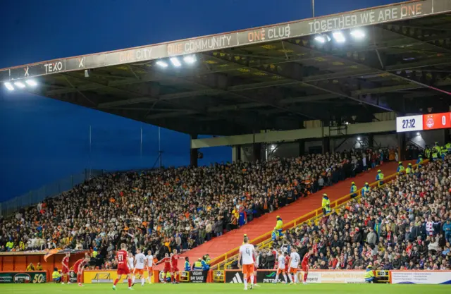 ABERDEEN, SCOTLAND - OCTOBER 26: Dundee United fans during a William Hill Premiership match between Aberdeen and Dundee United at Pittodrie Stadium, on October 26, 2024, in Aberdeen, Scotland. (Photo by Alan Harvey / SNS Group)