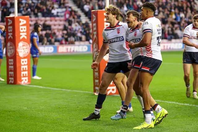 Matty Ashton of England score s try and celebrates