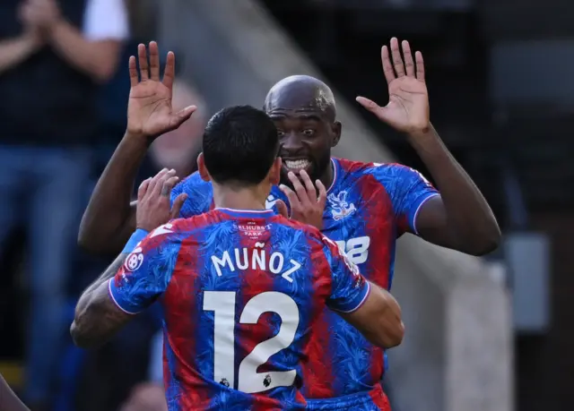 Mateta celebrates his goal with Munoz