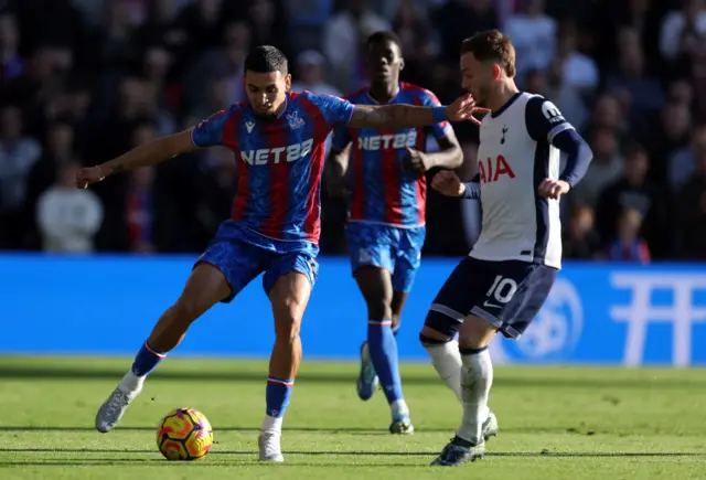 Munoz plays the ball before maddison can tackle