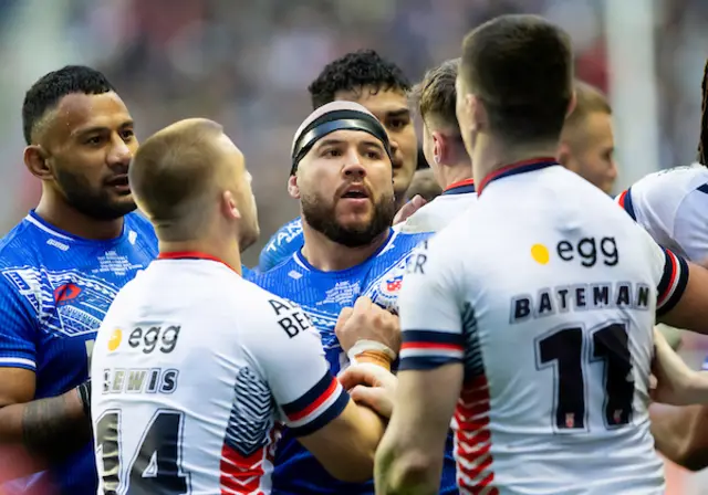 Samoa's Jazz Tevaga has an altercation with England's John Bateman on field.