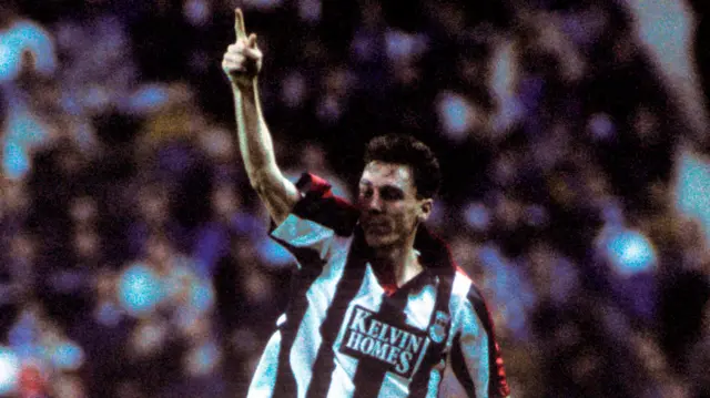 Kevin McGowne celebrates for St Mirren at Ibrox