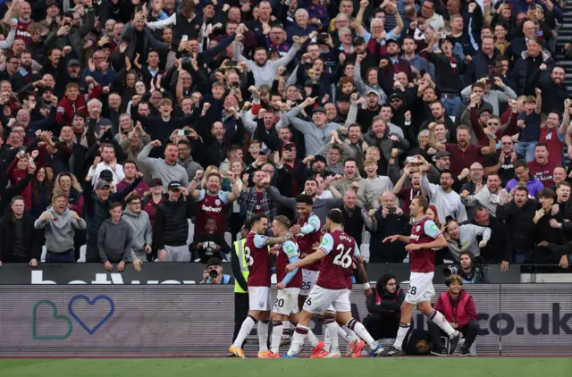 West Ham players celebrate with Bowen at the corner flag