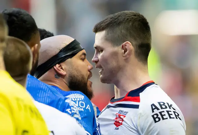 Samoa's Jazz Tevaga has an altercation with England's John Bateman on field.