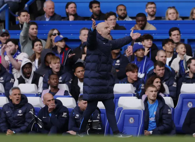 Maresca shouts and waves his hands on the touchline