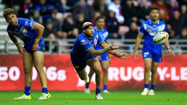 Jazz Tevaga of Samoa offloads