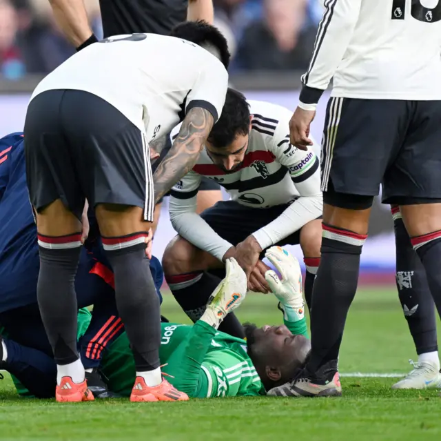 Onana is checked by physios