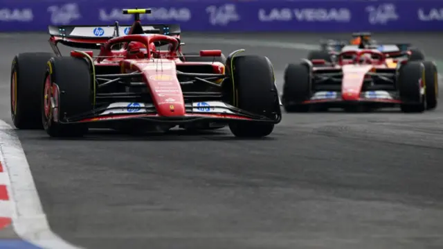 carlos sainz leads charles leclerc