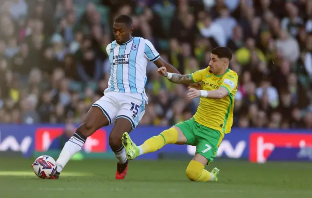 Anfernee Dijksteel of Middlesbrough is put under pressure by Borja Sainz of Norwich City