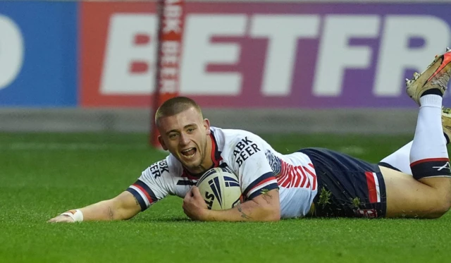 Mikey Lewis goes over for a try