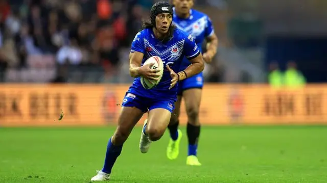 Jarome Luai of Samoa runs with the ball