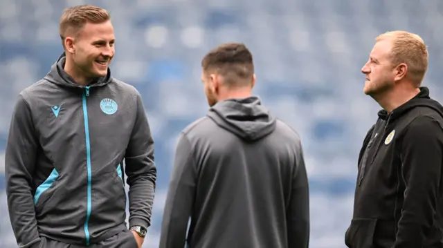 St Mirren striker James Scott (left) at Ibrox