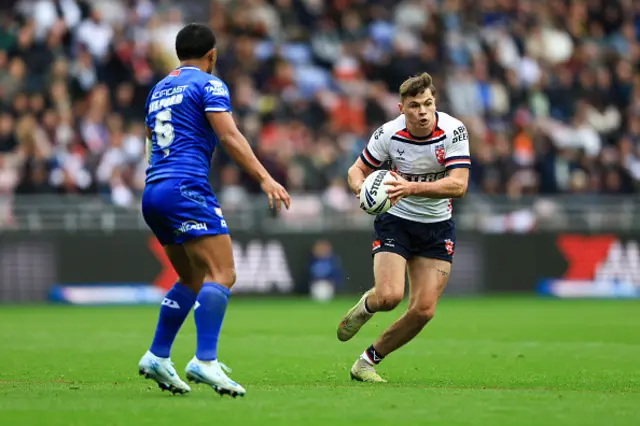 Jack Welsby of England runs with the ball