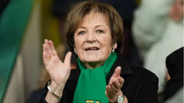 Delia Smith wearing a Norwich scarf