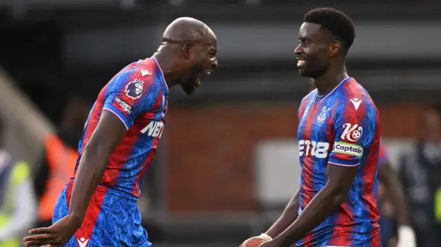 Jean-Philippe Mateta and Marc Guehi celebrate Crystal Palace's win over Tottenham