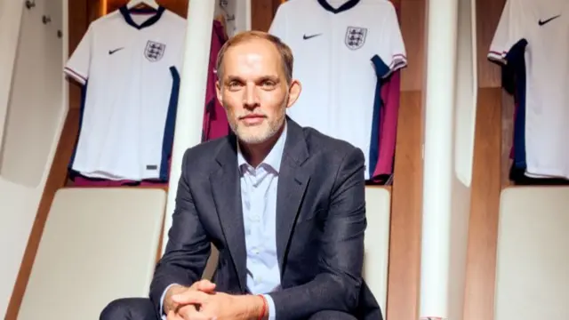 Thomas Tuchel poses for a photo inside the Wembley dressing room as he is announced as the new England manager.