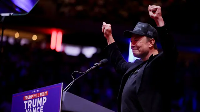 Tesla CEO and X owner Elon Musk gestures on stage during a rally for Republican presidential nominee and former U.S. President Donald Trump at Madison Square Garden, in New York, U.S., October 27, 2024.