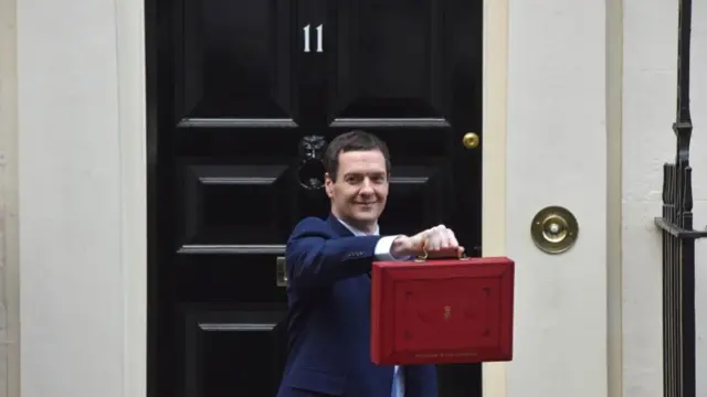 British Chancellor George Osborne leaving the Chancellors residence - No 11 Downing Street (Number 11 Downing St / number eleven) carrying the budget box / red ministerial despatch box, budget case, before delivering his budget on 16 Mar 2016.