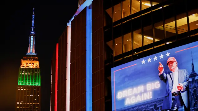 Donald Trump sign against Empire State Building in New York City