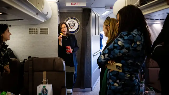 U.S. Vice President Kamala Harris eats Doritos and thanks senior staff for a great day aboard Air Force Two in Philadelphia, PA, U.S. on October 27, 2024.