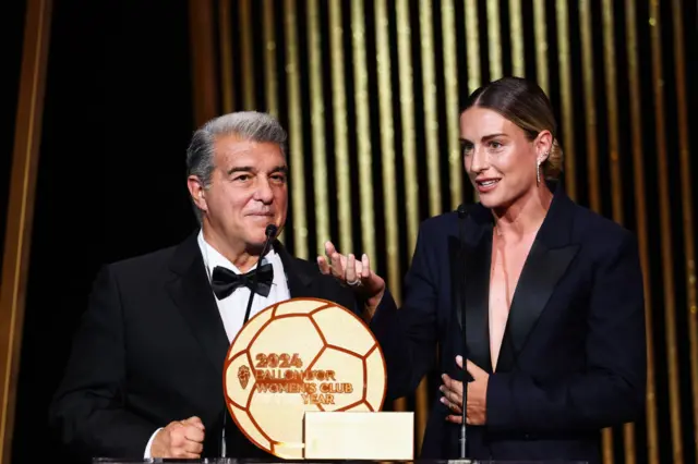 Winner of the Ballon d'Or 2021 and 2022, Barcelona's Spanish midfielder Alexia Putellas (R) and Barcelona's President Joan Laporta