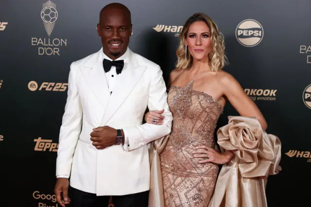 Ivorian former football player and evening host Didier Drogba and French-British journalist and evening host Sandy Heribert