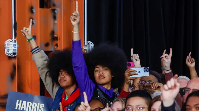 Supporters of the Democratic presidential nominee and U.S. Vice President Kamala Harris gesture during the Harris-Walz campaign community event at The Alan Horwitz "Sixth Man" Center, a youth basketball facility, as she campaigns in Philadelphia, Pennsylvania, U.S. October 27, 2024.