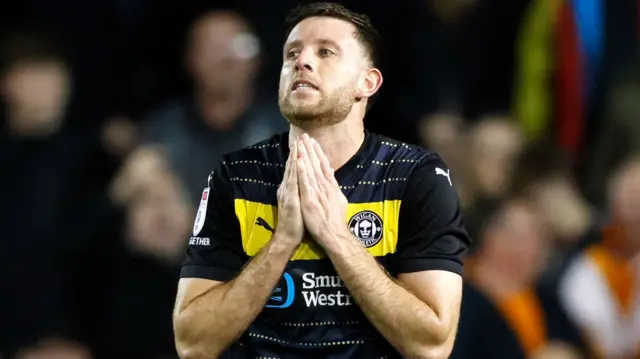 Wigan defender Will Aimson after his own goal.