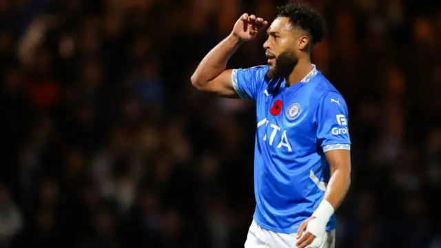 Kyle Wootton salutes the home fans after scoring against Reading