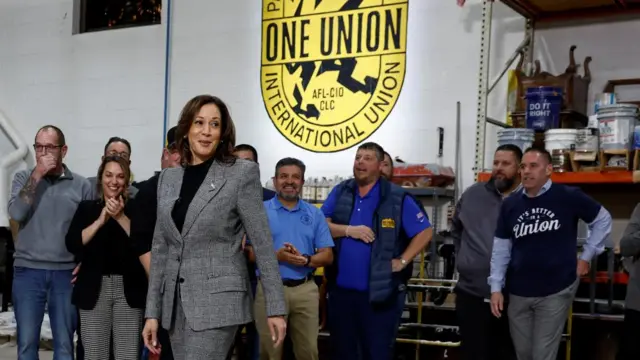 Democratic presidential nominee U.S. Vice President Kamala Harris visits IUPAT (International Union of Painters and Allied Trades) District Council 1M in Warren Michigan. She is standing in front of a group of union workers on a factory floor