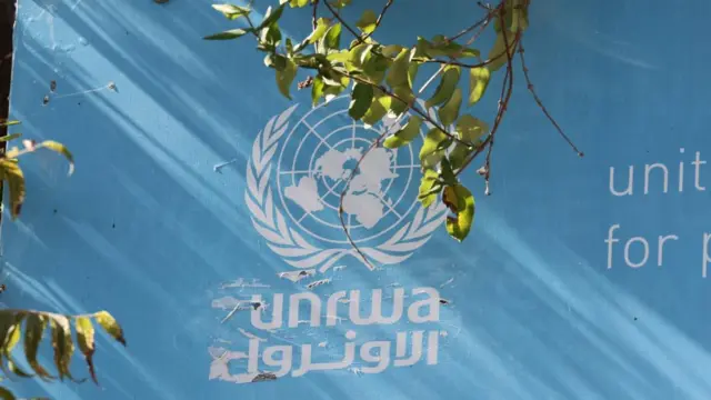 A sign at the entrance to the United Nations Relief and Works Agency for Palestine Refugees in the Near East (UNRWA) offices in Jerusalem