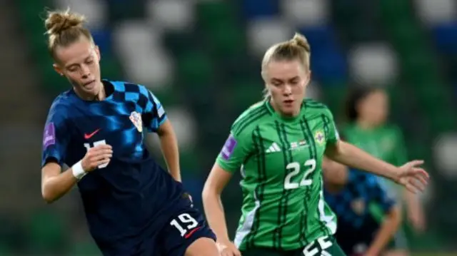 Janja Canjevac of Croatia battles for possession with Casey Howe of Northern Ireland