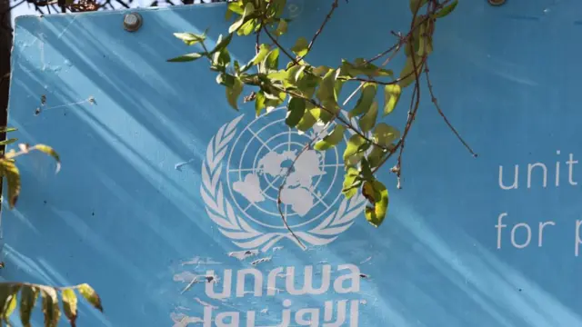 A sign at the entrance to the United Nations Relief and Works Agency for Palestine Refugees in the Near East (UNRWA) offices in Jerusalem