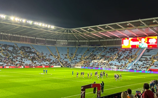 England players warming up before kick-off